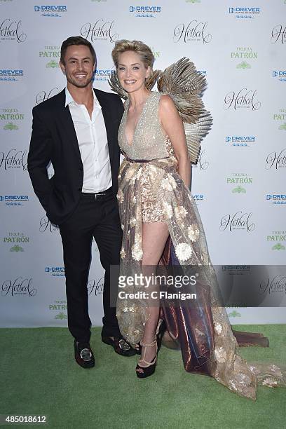 Gala Director Galen Drever and Actress Sharon Stone attend the Fourth Annual Hotbed Gala at The Drever Estate on August 22, 2015 in Tiburon,...