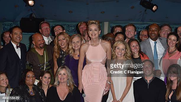 Sharon Stone poses with donors to 10,000 degrees during the Fourth Annual Hotbed Gala at The Drever Estate on August 22, 2015 in Tiburon, California.