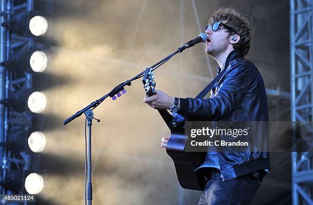 Mark Prendergast of Kodaline performs on stage during Day 2 of the V Festival at Hylands Park on August 23, 2015 in Chelmsford, England.