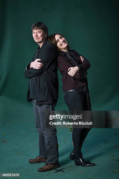 Scottish crime writer Ian Rankin and British singer and songwriter Viviane Katrina Louise "Viv" Albertine attend a photocall at Edinburgh...