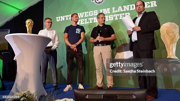 Helmut Sandrock, Benedikt Hoewedes, Manuel Neukirchner and Stephan Brause attend the closing event of the 'DFB Ehrenrunde' on August 23, 2015 in...