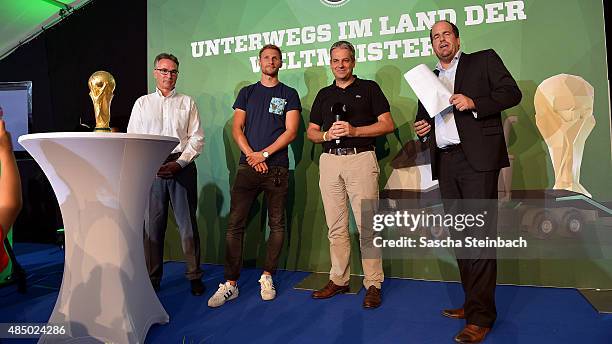 Helmut Sandrock, Benedikt Hoewedes, Manuel Neukirchner and Stephan Brause attend the closing event of the 'DFB Ehrenrunde' on August 23, 2015 in...
