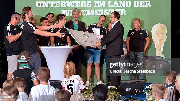 The 'Ehrenrunde' staff attends the closing event of the 'DFB Ehrenrunde' on August 23, 2015 in Kamen, Germany.