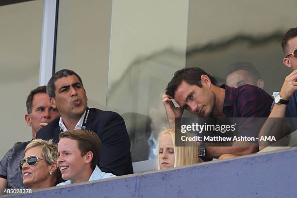 The injured Frank Lampard of New York City FC siting next to Director of football operations Claudio Reyna watches the MLS match between Los Angeles...