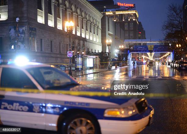 April 15 : Boston police investigate the scene of a suspicious backpacks left near Boston Marathon finish line on the first anniversary of Marathon...