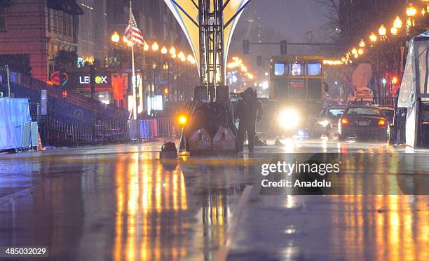 April 15 : Boston police investigate the scene of a suspicious backpacks left near Boston Marathon finish line on the first anniversary of Marathon...