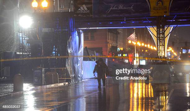 April 15 : Boston police investigate the scene of a suspicious backpacks left near Boston Marathon finish line on the first anniversary of Marathon...