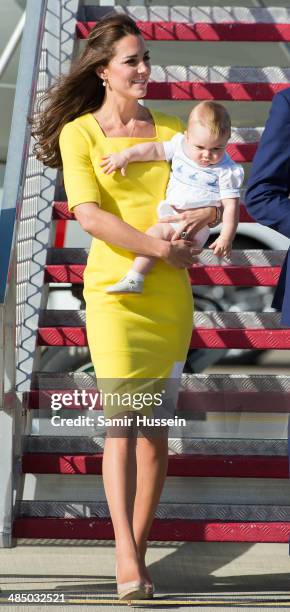 Catherine, Duchess of Cambridge and Prince George of Cambridge arrive at Sydney Airport on a Australian Airforce 737 aircraft on April 16, 2014 in...