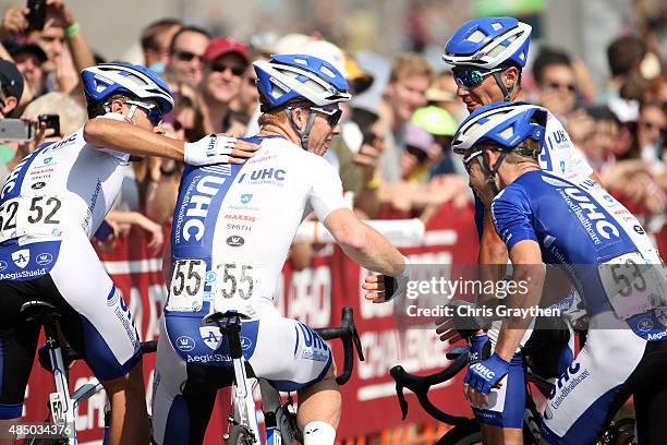 John Murphy of United States riding for UnitedHealthcare celebrates with his team after winning stage seven from Golden to Denver of the 2015 USA Pro...