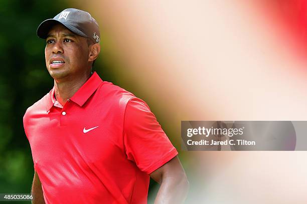 Tiger Woods walks off of the second tee box during the final round of the Wyndham Championship at Sedgefield Country Club on August 23, 2015 in...