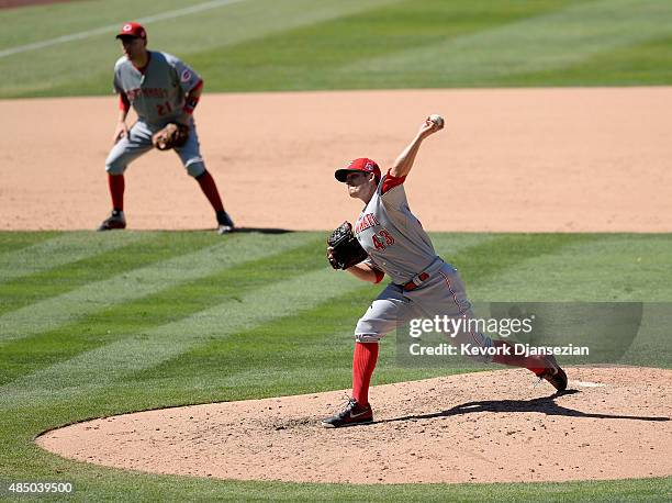 Pitcher Manny Parra of the Cincinnati Reds throws a pitch against the Los Angeles Dodgers during the seventh inning at Dodger Stadium August 16 in...