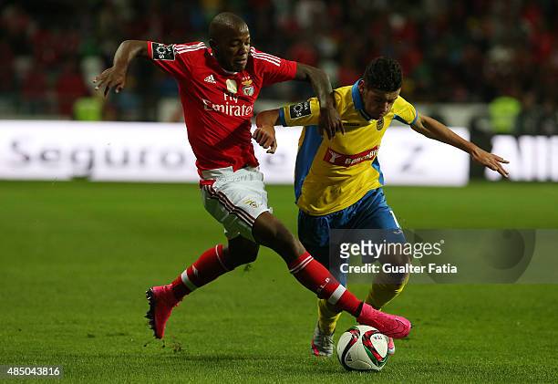 Benfica's midfielder Victor Andrade with FC Arouca's midfielder Ivo Rodrigues in action during the Primeira Liga match between FC Arouca and SL...