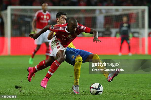 Benfica's midfielder Victor Andrade with FC Arouca's midfielder Ivo Rodrigues in action during the Primeira Liga match between FC Arouca and SL...