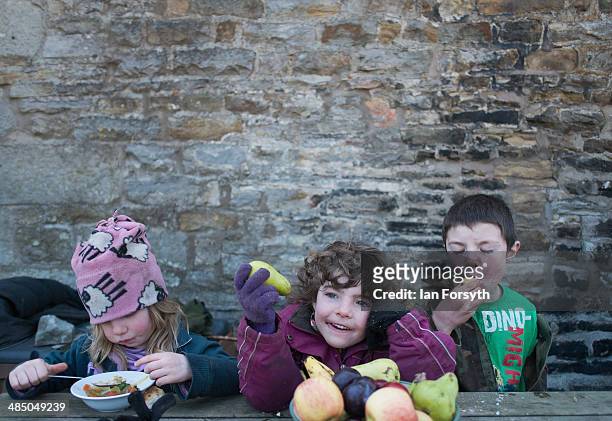 Violet Owen her sister Edith and her brother Miles enjoy soup and fruit for lunch at Ravenseat, the farm of the Yorkshire Shepherdess Amanda Owen on...