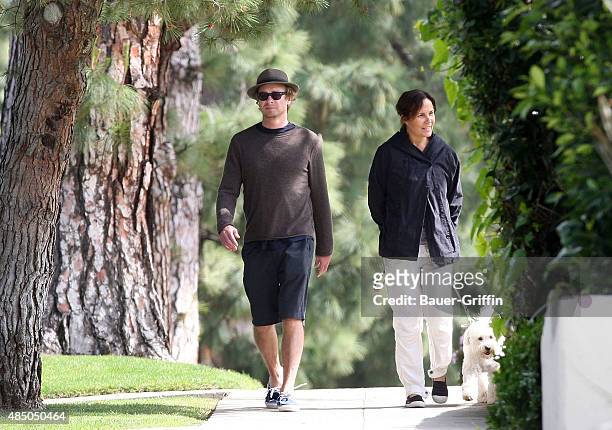 Simon Baker and wife Rebecca Rigg are seen walking their dog on March 13, 2011 in Los Angeles, California.