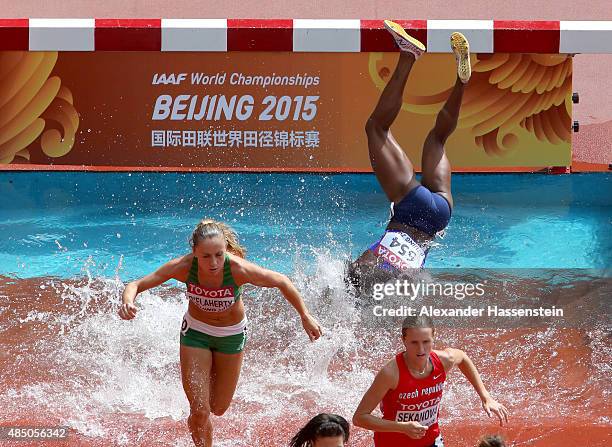 Rolanda Bell of Panama falls in the Women's 3000 metres steeplechase heats during day three of the 15th IAAF World Athletics Championships Beijing...