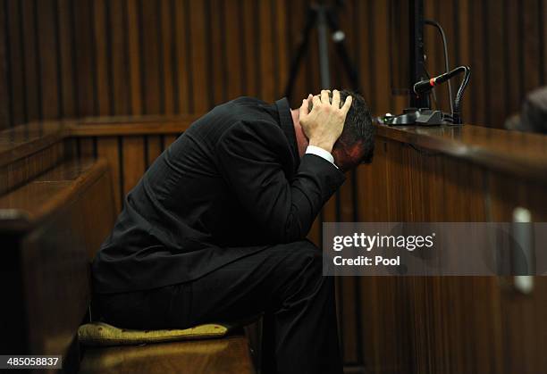 Oscar Pistorius listens to evidence in the Pretoria High Court on April 16 in Pretoria, South Africa. Oscar Pistorius stands accused of the murder of...