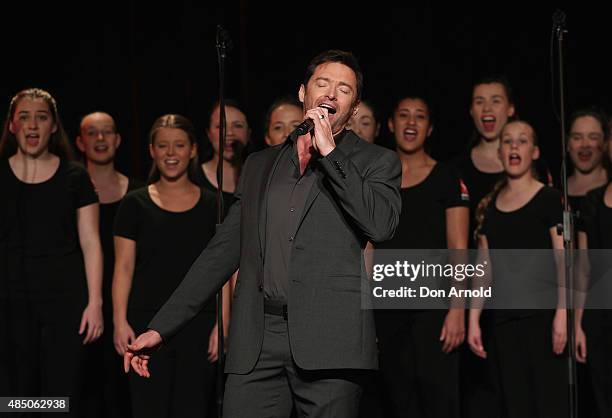 Hugh Jackman performs a song during a press conference at Four Seasons Hotel on August 24, 2015 in Sydney, Australia.