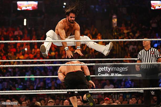 Seth Rollins and John Cena battle it out at the WWE SummerSlam 2015 at Barclays Center of Brooklyn on August 23, 2015 in New York City.