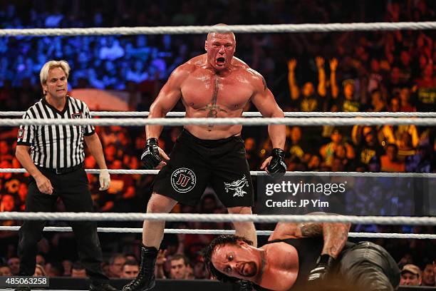 Brock Lesnar and The Undertaker battle it out at the WWE SummerSlam 2015 at Barclays Center of Brooklyn on August 23, 2015 in New York City.