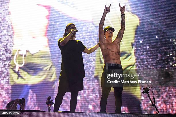 Skrillex and Justin Bieber perform live during the 2015 Billboard Hot 100 Music Festival at Nikon at Jones Beach Theater on August 23, 2015 in...