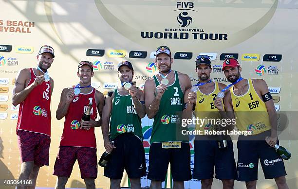 Philip Dalhausser and Nicholas Lucena of the USA, silver medal, Bruno Oscar Schmidt and Alison Cerutti of Brazil, gold medal and Adrian Gavira...