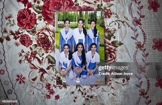 Year old Mousammat Akhi Akhter is pictured in the top left hand corner of her 6th grade class photo August 19, 2015 in Manikganj, Bangladesh. Last...