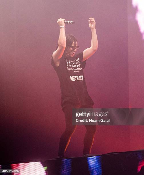 Skrillex performs onstage during the 2015 Billboard Hot 100 Music Festival at Nikon at Jones Beach Theater on August 23, 2015 in Wantagh, New York.