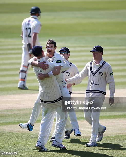 James Harris of Middlesex celebrates with team mates after claiming the wicket of Peter Siddle of Nottinghamshire tduring day four of the LV County...