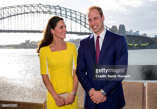 Catherine, Duchess of Cambridge and Prince William, Duke of Cambridge pose in front of Sydney Harbour Bridge as they visit the Sydney Opera House on...