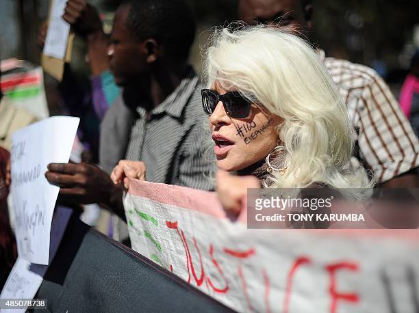 Activist Janine Boneparth demonstrates with conservation activists in Nairobi, on August 24 against the release on bail of suspected ringleader of an...