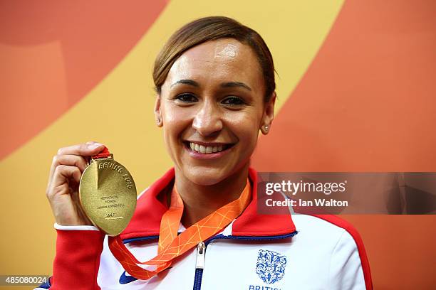 Gold medalist Jessica Ennis-Hill of Great Britain poses during the medal ceremony for the Women's Heptathlon during day three of the 15th IAAF World...