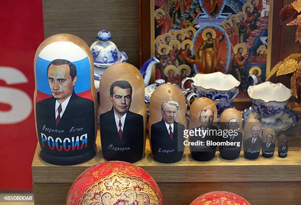 Wooden matryoshka dolls featuring Russian political leaders including, from left, Vladimir Putin, Dmitry Medvedev, Boris Yeltsin, Mikhail Gorbachev,...