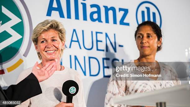 Steffi Jones and Silvia Neid attend the Allianz Women's Bundesliga season opening press conference at DFB Headquarters on August 24, 2015 in...