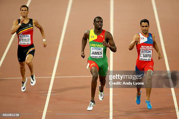 Kevin Borlee of Belgium, Kirani James of Grenada and Luguelin Santos of the Dominican Republic cross the finish line in the Men's 400 metres...