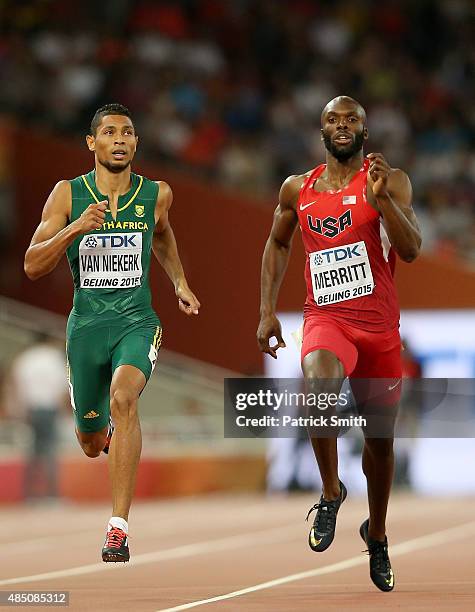 Wayde Van Niekerk of South Africa and Lashawn Merritt of the United States compete in the Men's 400 metres semi-final during day three of the 15th...