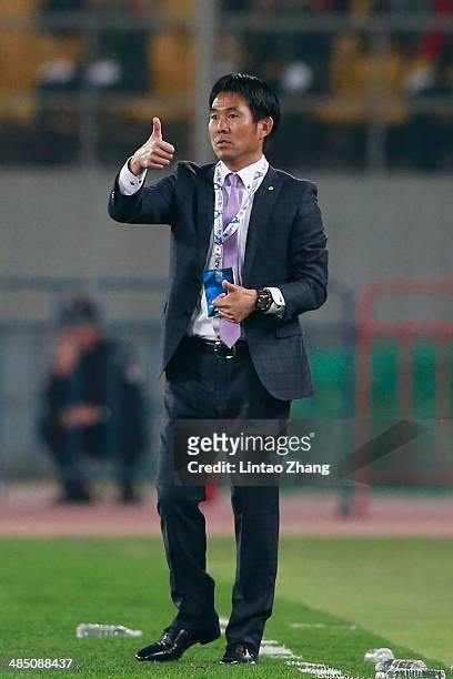 Sanfrecce Hiroshima head coach Hajime Moriyasu reacts during the AFC Champions match between Sanfrecce Hiroshima and Beijing Guo'an at Workers...