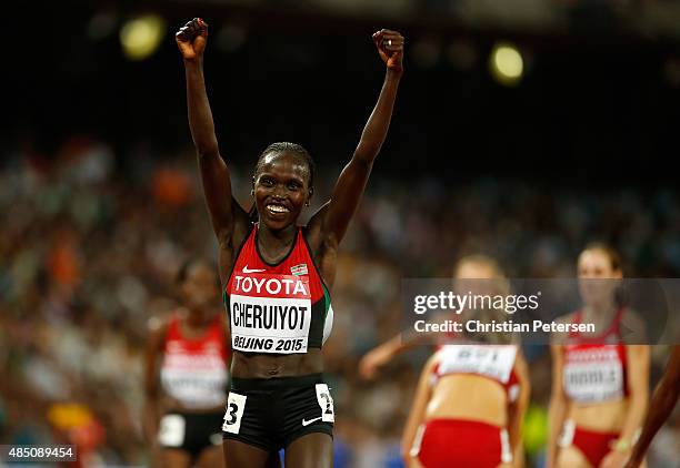 Vivian Jepkemoi Cheruiyot of Kenya celebrates after winning gold in the Women's 10000 metres final during day three of the 15th IAAF World Athletics...