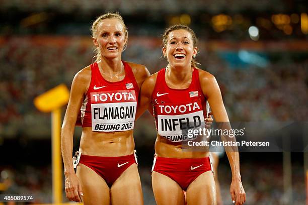 Emily Infeld of the United States is congratulated by Shalane Flanagan of the United States after winning bronze in the Women's 10000 metres final...