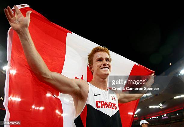 Shawnacy Barber of Canada celebrates after winning gold in the Men's Pole Vault final during day three of the 15th IAAF World Athletics Championships...