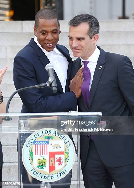 Recording artist Shawn "Jay Z" Carter and Los Angeles Mayor Eric Garcetti make an announcement on the Steps of City Hall Downtown Los Angeles for a...