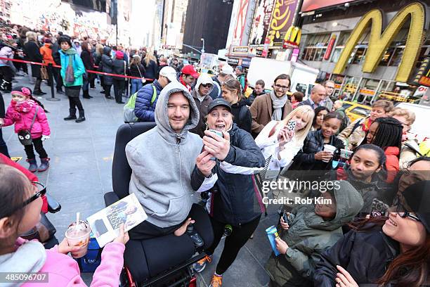 Nick Vujicic, New York Times best selling author, motivational speaker and leader of the nonprofit organization Life Without Limbs, greets fans at...