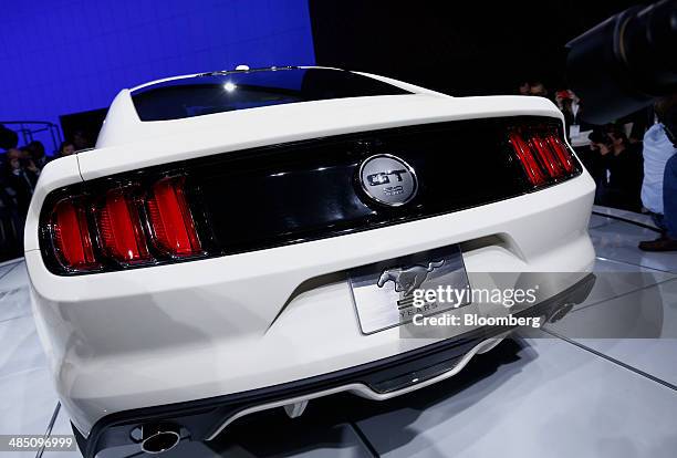 The limited edition Ford Motor Co. Mustang GT sits on display after being unveiled at the 2014 New York Auto Show in New York, U.S., on Wednesday,...