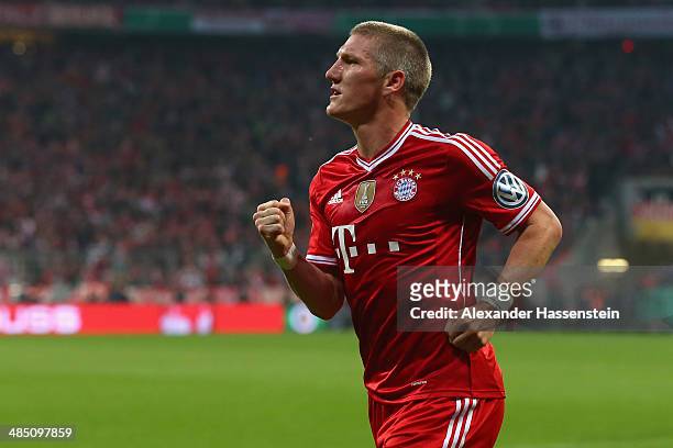 Bastian Schweinsteiger of Muenchen celebrates scoring the opening goal during the DFB Cup semi final match between FC Bayern Muenchen and 1. FC...