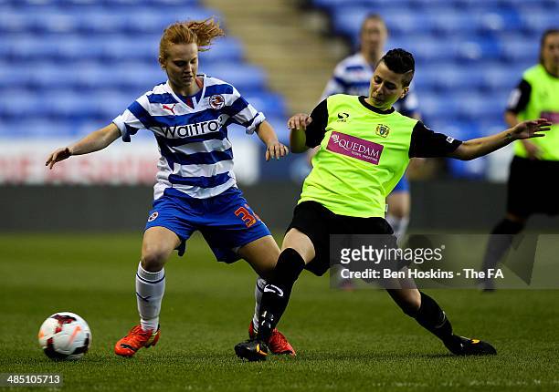 Paige Stewart of Yeovil flicks the ball on ahead of Molly Bartrip of Reading during the FA WSL 2 match between Reading and Yeovil Town on April 16,...