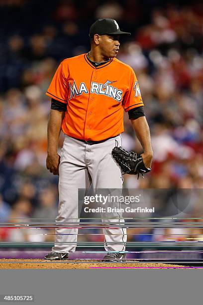 Carlos Marmol of the Miami Marlins peppers to throw a pitch during the game against the Philadelphia Phillies at Citizens Bank Park on April 12, 2014...