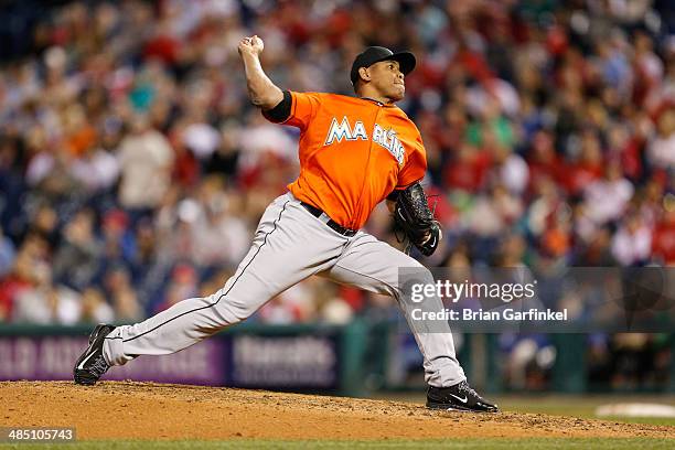 Carlos Marmol of the Miami Marlins throws a pitch during the game against the Philadelphia Phillies at Citizens Bank Park on April 12, 2014 in...