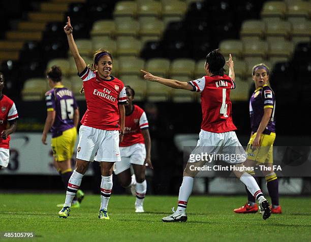 Alex Scott of Arsenal Ladies FC celebrates with team mate Yukari Kinga after she scores the first goal of the game for her side during the FA WSL 1...
