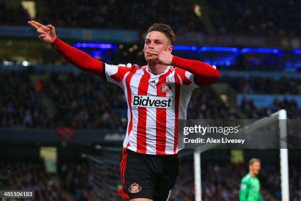 Connor Wickham of Sunderland celebrates scoring their first goal during the Barclays Premier League match between Manchester City and Sunderland at...