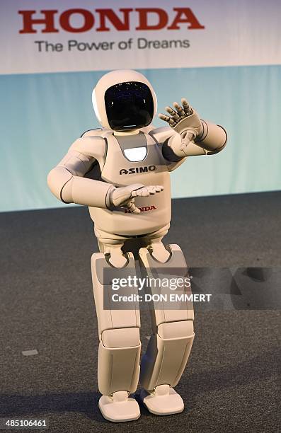 Honda North America makes their North American debut of their new Asimo Robot as it demonstrates its ability to dance at a news conference...